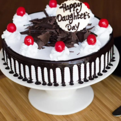 black forest cake for daughter with whipped cream and cherries