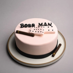 cigar-themed boss day fondant cake with intricate design