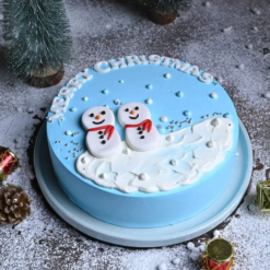 Magical Snowman Christmas Cake with festive decorations and snowy design