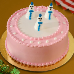 winter forest christmas cake with frosted trees and holiday decor