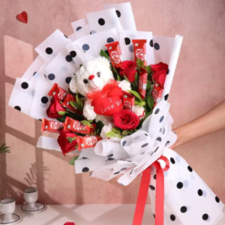 Teddy bear, chocolate, and flower combo gift