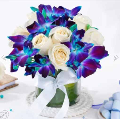 Orchid and pearl rose bouquet for online delivery India