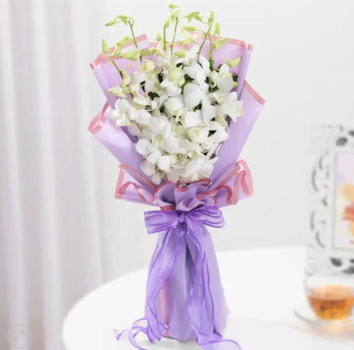 Elegant white orchid bouquet for delivery in India