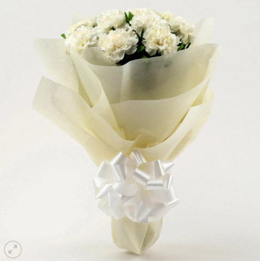 White carnation bouquet with elegant wrapping
