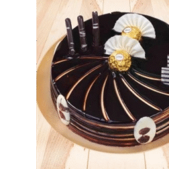 Golden Crunch Choco Bomb with nut topping and chocolate glaze