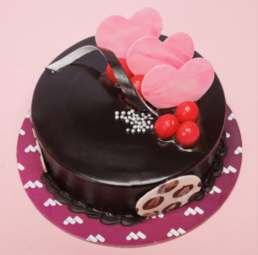 Luscious Cocoa Dream Cake topped with chocolate drizzle and decorations