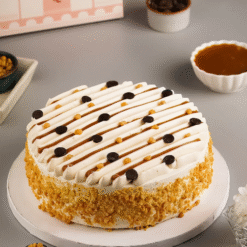Golden Caramel Crunch Butterscotch Cake with creamy frosting