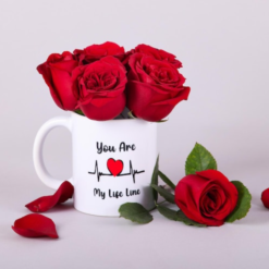 Romantic red roses arranged beautifully in a mug