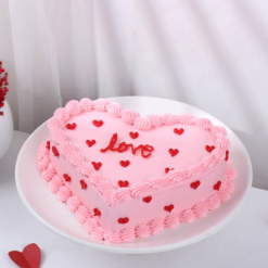 Alternative view of heart chocolate cake with red roses